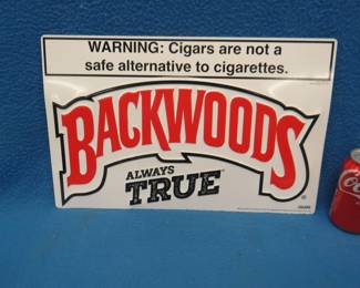 Lot 300. Backwoods metal sign. 17" x 11".