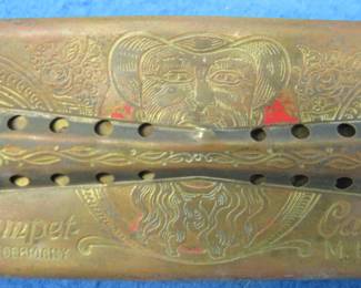 Lot 36. M. Hohner Trumpet Call "Oriental Beauty Old Man" double-sided 64-hole tremolo harmonica. Sounds great. Minimum bid $200.