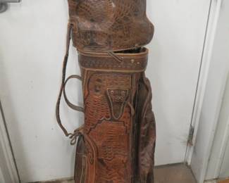 Lot 65. RH women's golf clubs. Includes Wilson Carol Mann irons 3-PW, matching 1,3,4 woods, and leather bag, bag cover, and head covers.