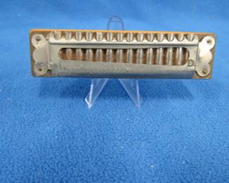 Lot 34. Ands Koch Harmonium 28-hole diatonic harmonica in the key of D. Some reeds do not sound.