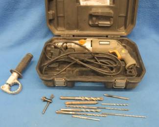 Lot 279. Rockwell hammer drill with case, manual, bits, and hand brace.