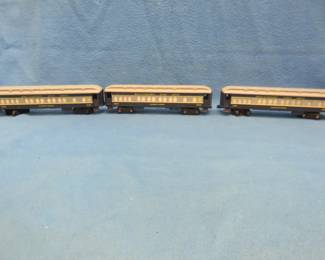 Lot 276. Three Lionel passenger cars that light up