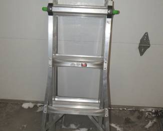 Lot 66. Mighty Multi adjustable ladder. Working heights as pictured.