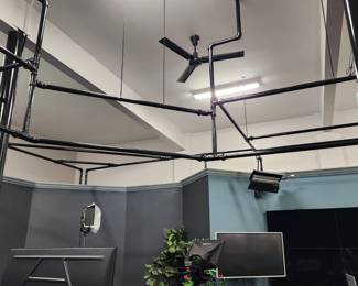 1500 linear feet of galvanized steel pipes, currently used as a ceiling frame for lighting & "rod" for the drapes. Purchased painted flat black, but owner painted it all gloss black