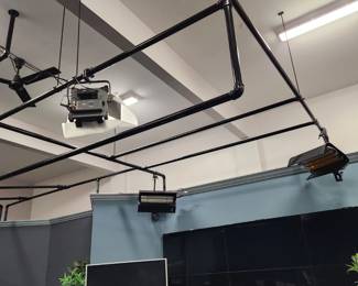 1500 linear feet of galvanized steel pipes, currently used as a ceiling frame for lighting & "rod" for the drapes. Purchased painted flat black, but owner painted it all gloss black