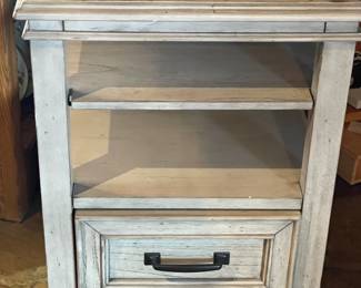 We have 2 of these. Solid wood, named brand side table. Beach grey 2 for $249