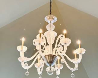 Contemporary Murano Glass chandelier with 8 gracefully curved arms, each with a ribbon dangling sphere. 44" Diam. x 42" H