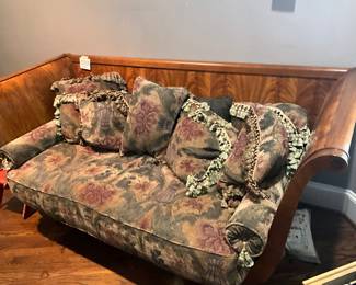 Feathered mahogany settee with loose pillow seat