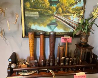 Collection of old brass water hose sprayers, spools, etc