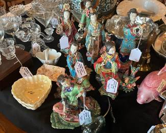 Grouping of porcelains with minor flaws typically on fingers.