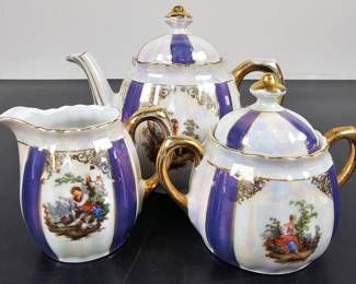 Lot #91 - Antique Schaller Bavaria Porcelain Tea Set - Teapot, Creamer, Sugar Bowl with Gold Accents & Painted Scene
