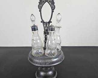 Lot #164 - Vintage Metal and Glass Cruet Set with Etched Floral Design and Stand