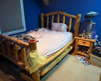 . . . a full-sized log bed -- great for cabin or cottage