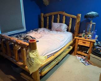 . . . a full-sized log bed -- great for cabin or cottage