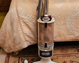 Shark vacuum with accessories.