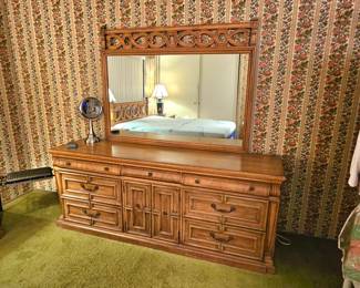 MCM dresser lowboy design with matching mirror.