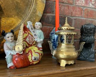 Symbolic Asian figurines, brass incense burners