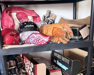 Hockey gear, hockey skates, JOFA hockey helmet, hockey gloves, hockey pucks 