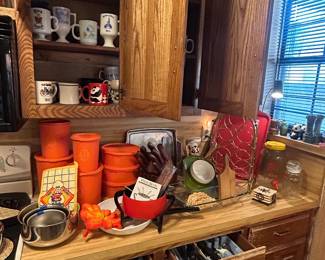 Brass wine racks, vintage lamp, mid-century and retro kitchen decor and storage pieces. New, never-used retro fondue set