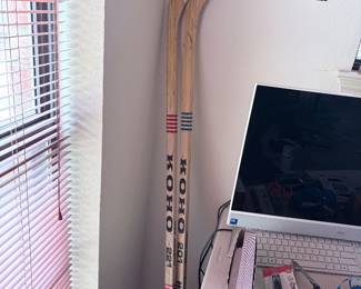 hockey sticks, hockey pucks 