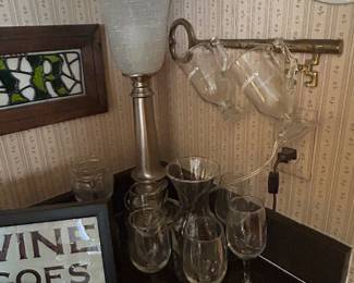 Barware, stemware and accessories. Brass wall decor – for hanging just about anything!