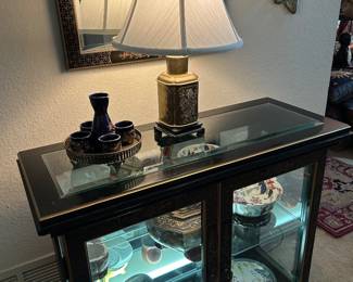 Asian inspired lighted display cabinet