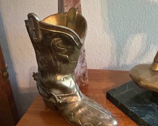 American brass cowboy boot, granite obelisk