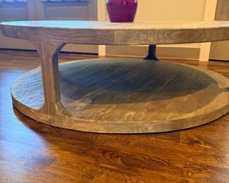 Restoration Hardware round two-tier coffee table, close-up detail