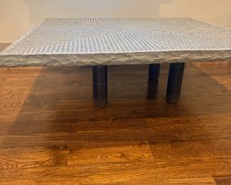 Modern coffee table with woven textured surface
