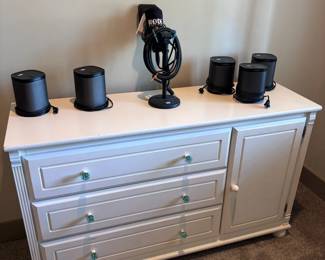White 6-drawer dresser with studio speakers and microphone