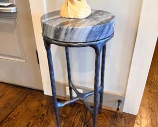 Round marble top accent table, iron base, with figural candle