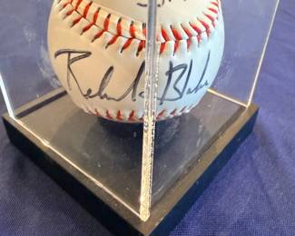 Signed baseball in acrylic display case