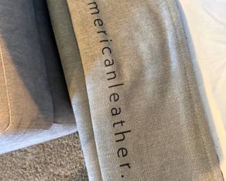 American Leather brand tag on sectional sofa