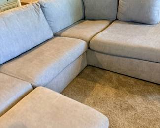 Grey sectional sofa close-up detail