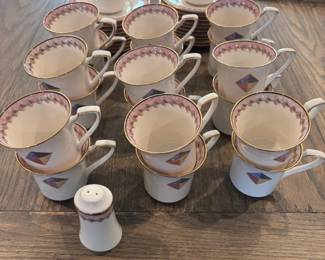 Set of fine china teacups with gold trim