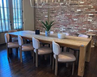 Dining room: RH driftwood table with upholstered chairs, modern chandelier