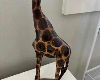 Tall carved wood giraffe sculpture