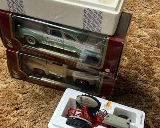 Lots of Danbury Mint collectors cars and trucks