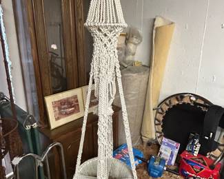 Two white macrame hanging table planters
