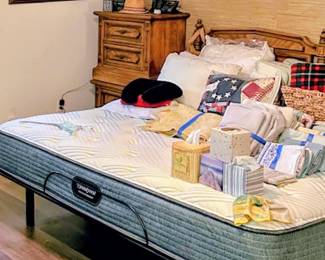 King Adjustable Bed with frame. Excellent Condition . End tables, Linens