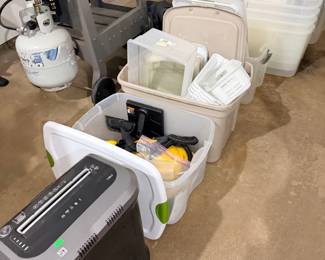 paper shredder, steam cleaner, plastic storage tubs