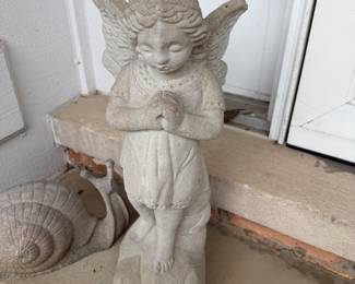 Cement angel garden statue