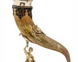 Lot 32 German Silver Plate Drinking Horn on Figural Stand 19th Cent., H 27" W 7" L 20"