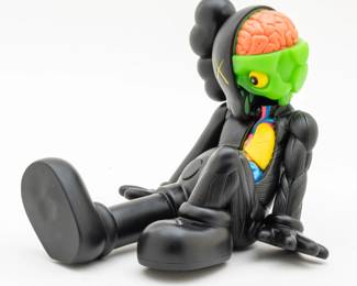 Lot 1026 KAWS (Brian Donnelly) (American, B. 1974) Painted Cast Vinyl Resting Place Companion (Black), 2013, H 8" W 8" L 10"