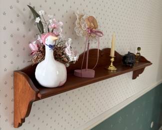 Wall shelf with decor.
