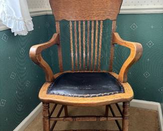 Vintage oak pressback armchair.