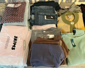 Women’s clothing, much new with tags, by Skims, Lands’ End, Sculpt-Her, L.L. Bean, and others.