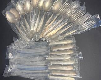 j NRA Sterling Silver Flatware Set