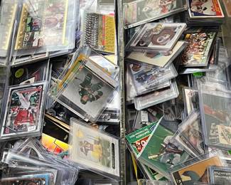 Sports cards baseball basketball and football