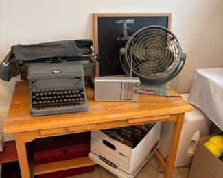Vintage typewriter and fan